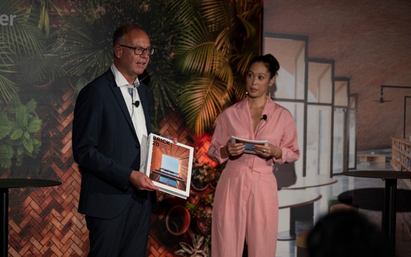 Heimo Scheuch presenting the Brick 20 book at the Brick Award 20 Ceremony