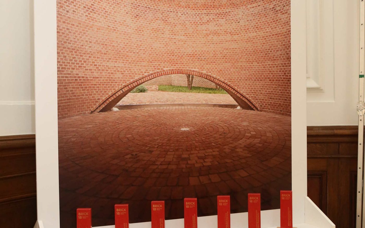 Books and trophies on stage, Photo: Eric Deron