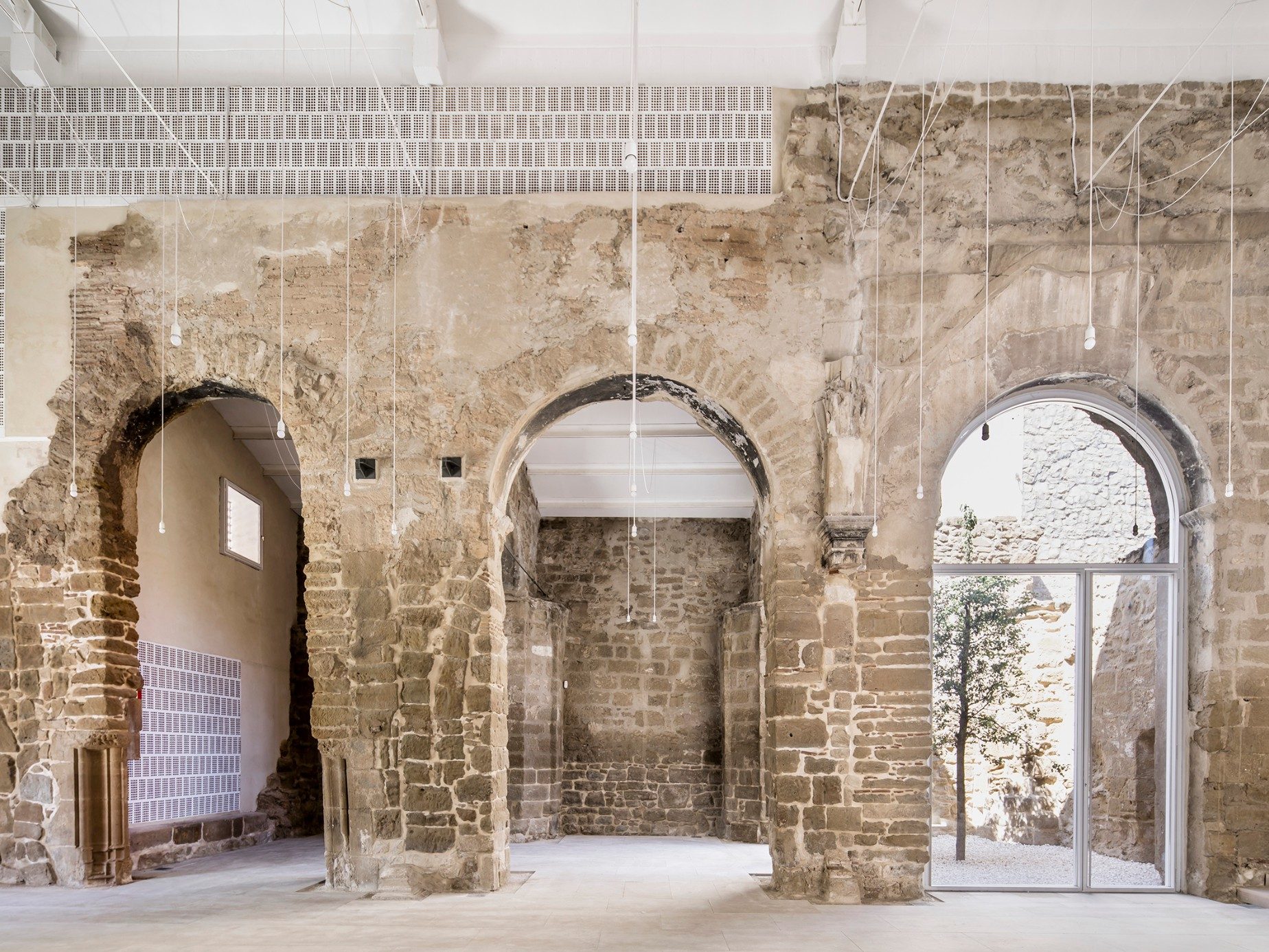 The Old Church of Vilanova de la Barca with facing bricks and roof tiles; Brick Award 2018 Special Prize Winner, Category "Building outside the Box"; Aleaolea Architecture & Landscape; Photo:  Adrià Goula