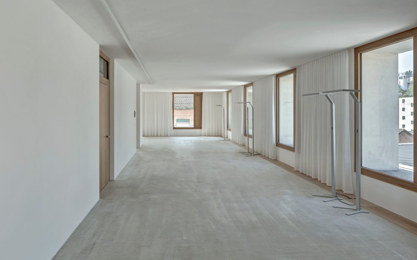 2226 Emmenweid. Brick Award 22 Category "Working together". Baumschlager Eberle Architekten. Hallway view